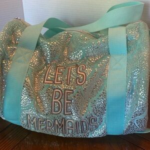 Justice sea foam and silver overnight bag